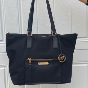 Michael kors purse with waterproof material
